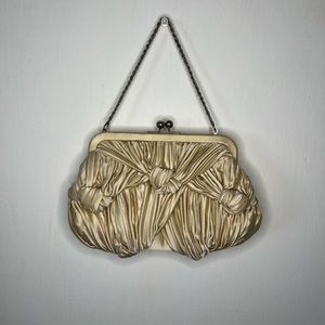Cute, small hand bag. Soft silk like brand new never used.